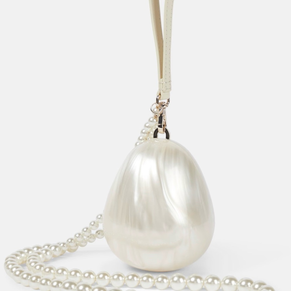 Simone Rocha always elegance with this marbled Egg clutch, brand new 💗